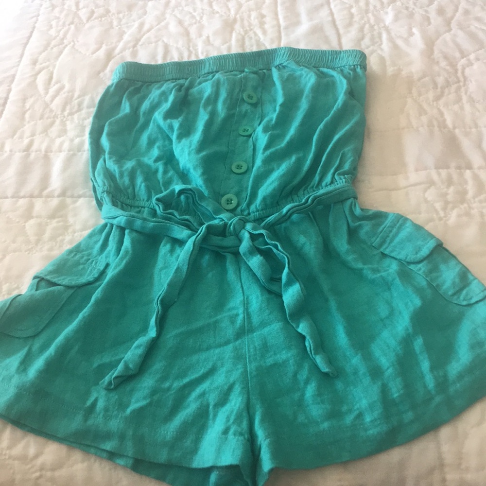 Teal green romper.